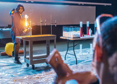 Instructor performing a lab experiment